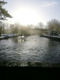 Scenic view of river against sky