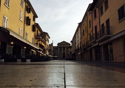 Street in city against sky