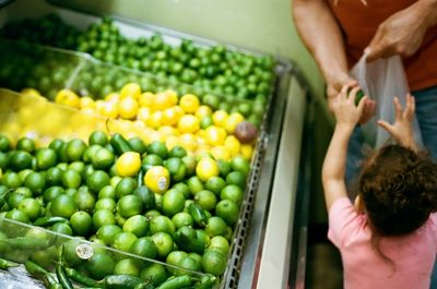 Cropped image of hand holding food
