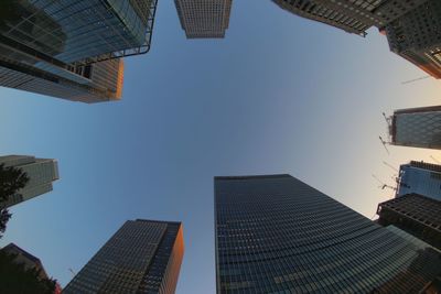 Low angle view of buildings against sky in city