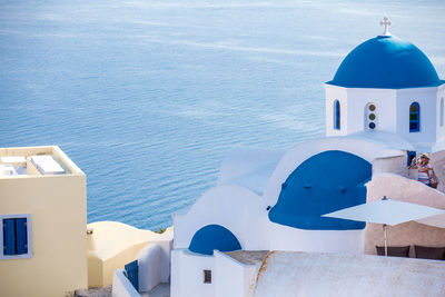 Traditional architecture of the churches of the oia city in santorini island