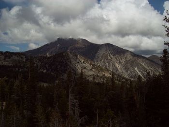 View of mountain range against cloudy sky