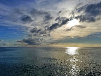 Scenic view of sea against sky at sunset