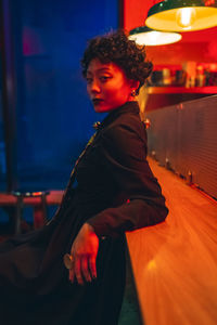 Side view of boy looking away at home