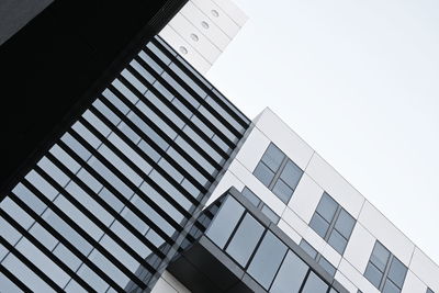 Low angle view of modern building against clear sky