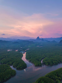 Scenic view of landscape against sky during sunset