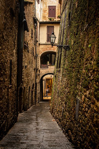 Narrow alley along buildings