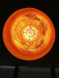 Close-up of illuminated light bulb