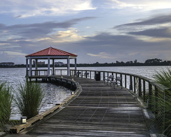 Pier over sea against sky