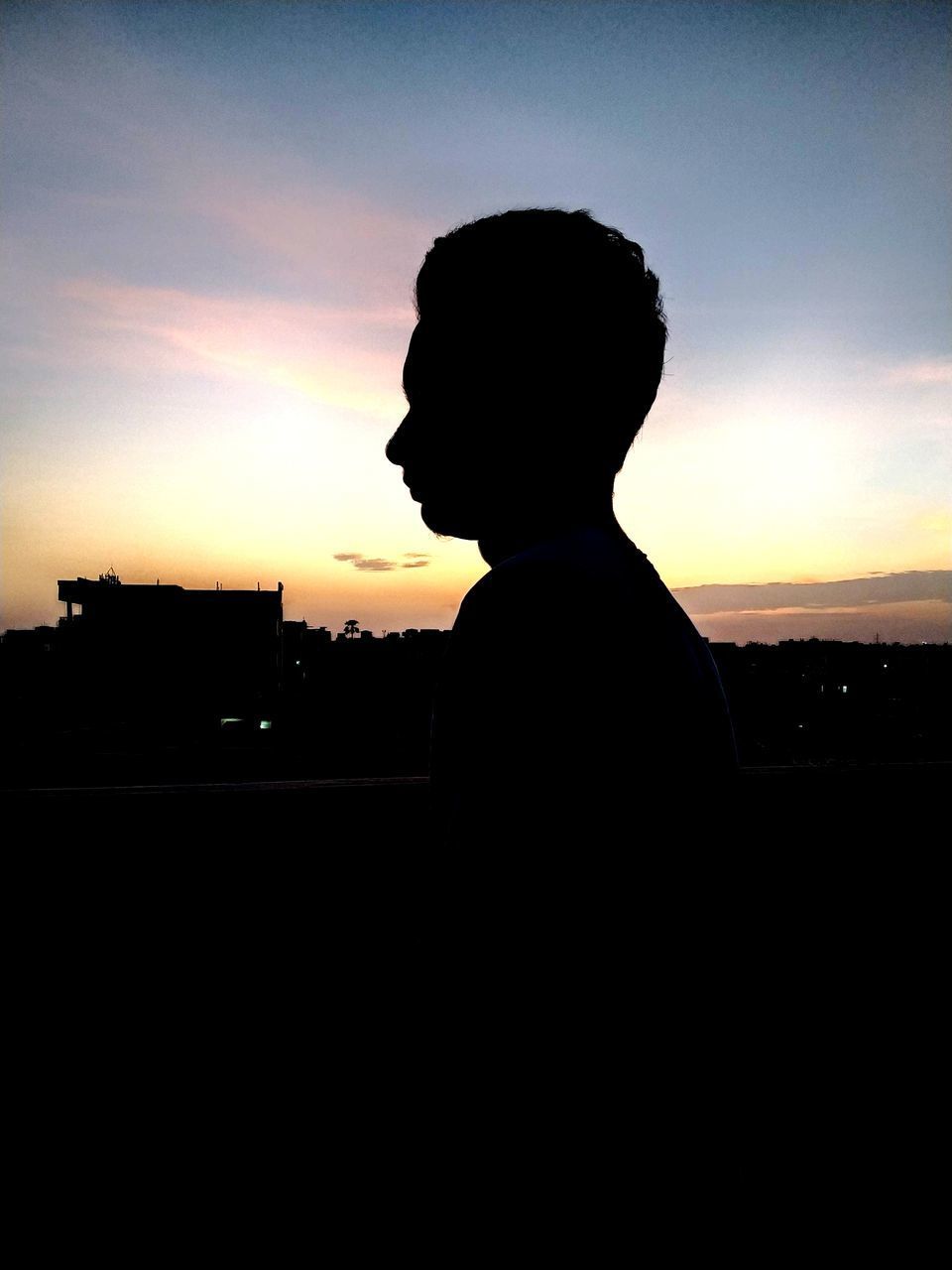 SILHOUETTE MAN STANDING AGAINST SKY DURING SUNSET