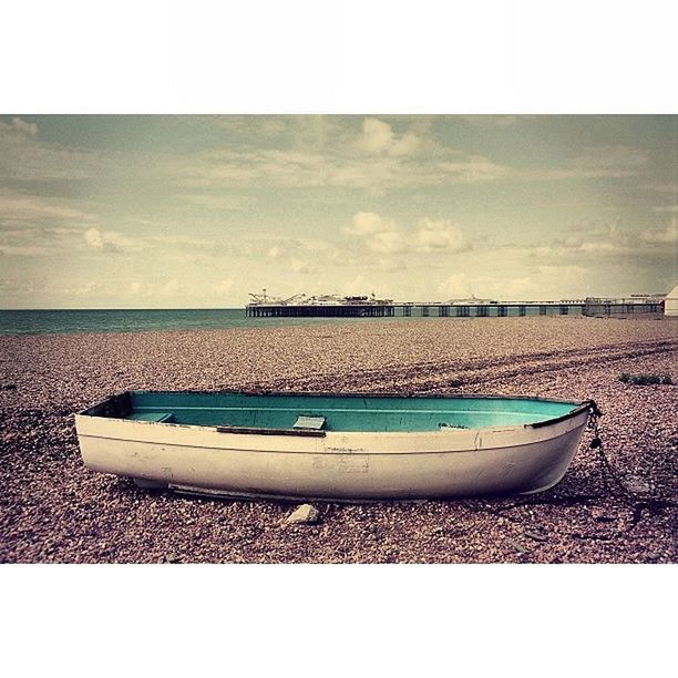 sea, water, nautical vessel, transfer print, sky, boat, transportation, moored, mode of transport, auto post production filter, beach, horizon over water, shore, tranquility, tranquil scene, nature, scenics, cloud - sky, sand, beauty in nature