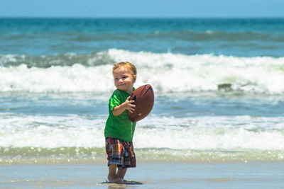 Woman standing on beach