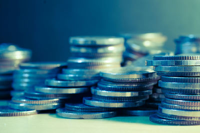 Close-up of coins on table