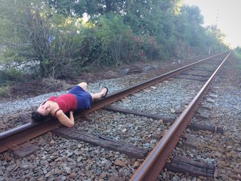 High angle view of person on railroad track