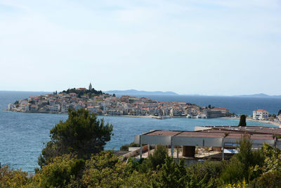 High angle view of town with buildings in background