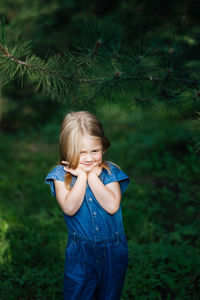 Portrait of girl standing on land