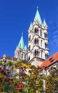 Low angle view of building against blue sky