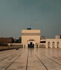 View of mosque against sky in city