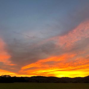 Scenic view of dramatic sky during sunset