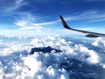 Low angle view of airplane flying in sky