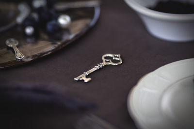 Close-up of electric lamp on table
