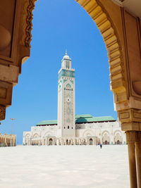 Mosque hassan ii seen through arch