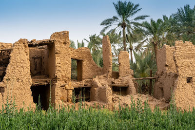 Old ruin on field against clear sky