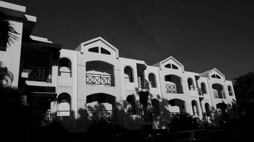 Low angle view of buildings against clear sky