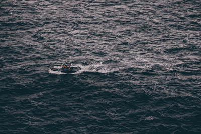 High angle view of people sailing in sea