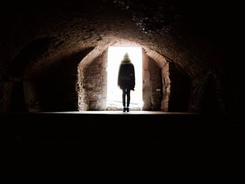 People walking in tunnel