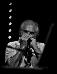 Portrait of man sitting outdoors