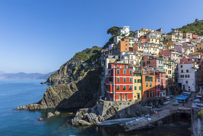 Italy, liguria, riomaggiore, edge of coastal town along cinque terre