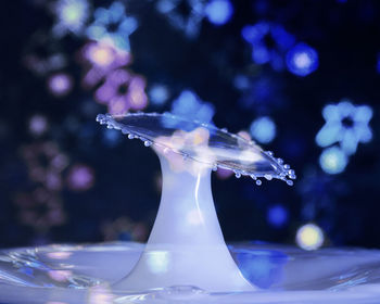 Close-up of water splashing in glass