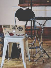 Close-up of empty chairs on table at home