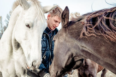 Close-up of man with horse