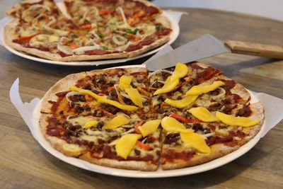 High angle view of pizza in plate on table