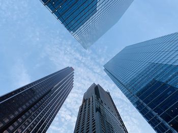 Low angle view of modern buildings against sky