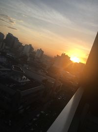 High angle view of cityscape against sky during sunset