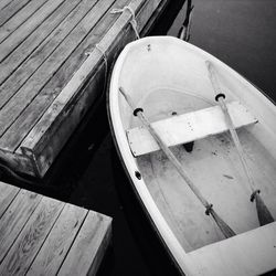 Close-up of boats in river