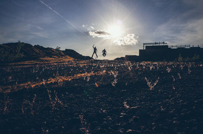 Sun shining over landscape