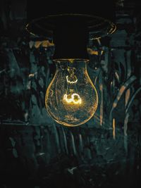 Close-up of illuminated light bulb