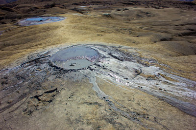High angle view of text on rock