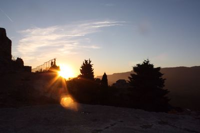 Scenic view of mountains against sky during sunset