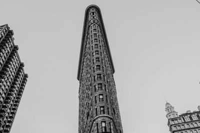 Low angle view of skyscraper against clear sky