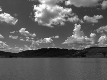 Scenic view of sea against cloudy sky