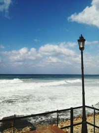 Scenic view of sea against blue sky
