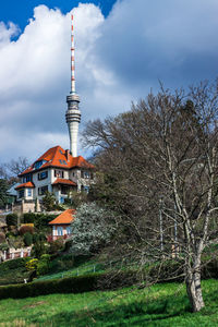 View of buildings against cloudy sky