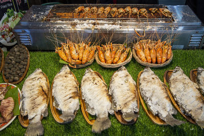 High angle view of seafood on barbecue grill