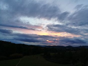 Scenic view of dramatic sky over landscape