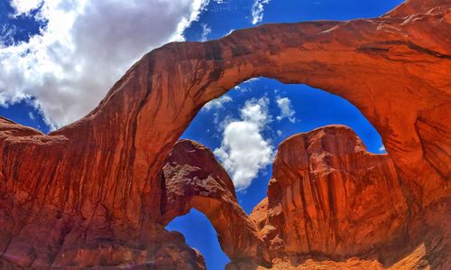 Low angle view of rocky mountains against clear sky